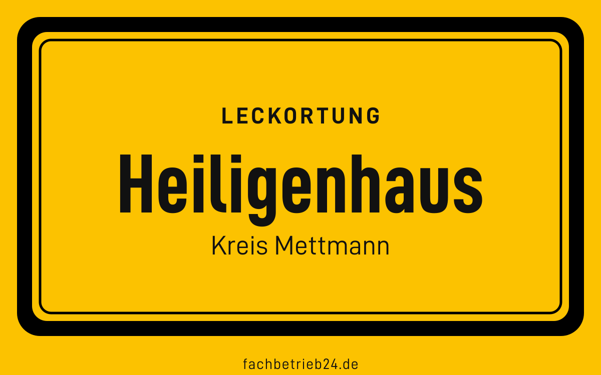 Gelbe Ortstafel Heiligenhaus mit der Kopfzeile Leckortung