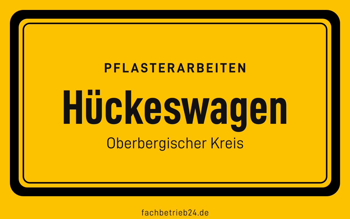 Gelbe Ortstafel Hückeswagen mit der Kopfzeile Pflasterarbeiten