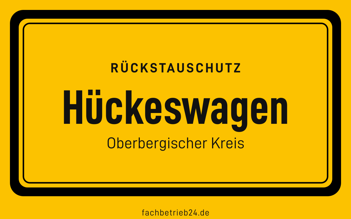 Gelbe Ortstafel Hückeswagen mit der Kopfzeile Rückstauschutz